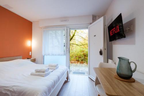 Studio rez de chaussée avec terrasse centre thermal et touristique - Casa Amnéville