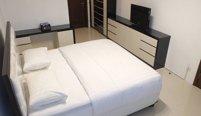 Studio Room At St. Moritz Presidential Puri By Travelio - Jakarta