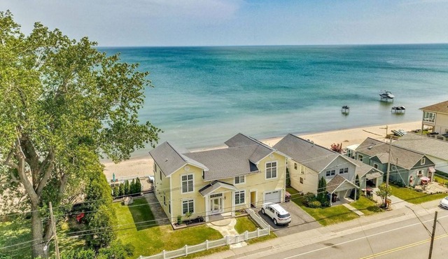 Stunning 2,445 Sq. Ft. 2 Story Beach Estate W/ Private Beach!