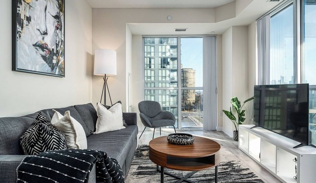 Stunning 2 Bedroom + Den Condo
