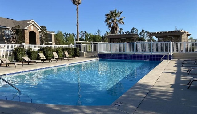 Stunning 3BR, 2BA luxury retreat with pool view, just 7 miles from the beach!