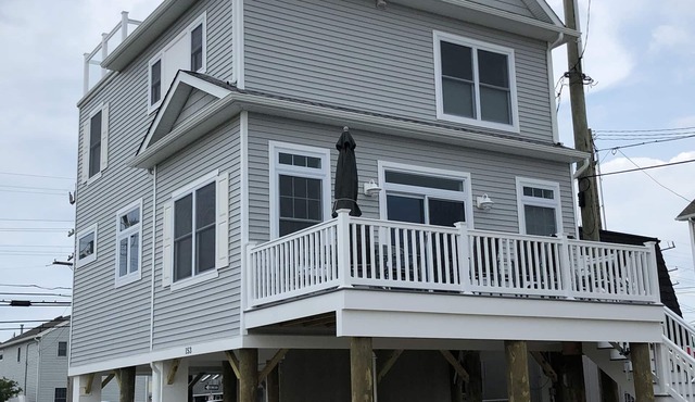 Stunning 5 Bedroom, 3 Bath w/Fabulous Decks and Views (1/2 block from the beach)