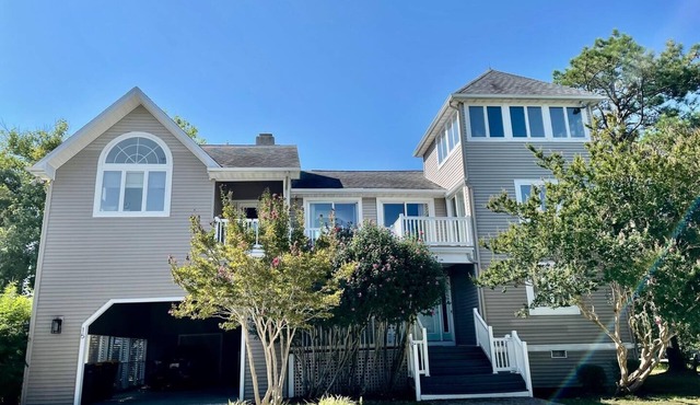 Stunning 6-Bedroom Home with Marina Views, Beach Access, & Luxury Amenities!