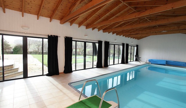 Stunning 6 bedroom 6 bathroom country home with large private indoor heated swimming pool