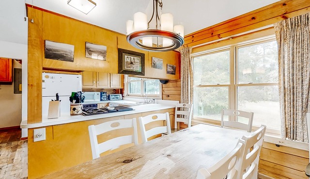 Stunning and remote riverfront home with private dock & gas grill