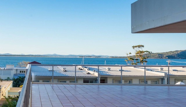 Stunning apartment with water views and a pool