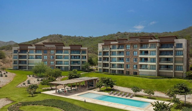 Stunning Apt. with Ocoa's Bay View, 2 bedrooms, Beach Club.