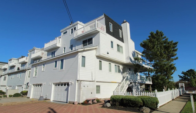 Stunning Beachfront Home with Panoramic Ocean & Bay Views