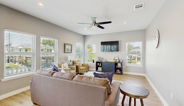 Stunning canal front, dog friendly home with private deck and gas grill