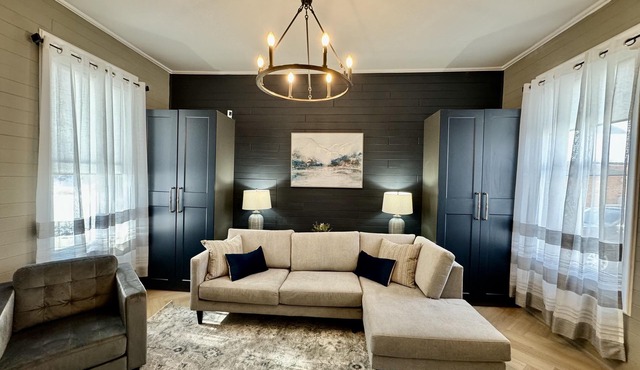 Stunning Century Riverfront Estate with sweeping waterfront views.