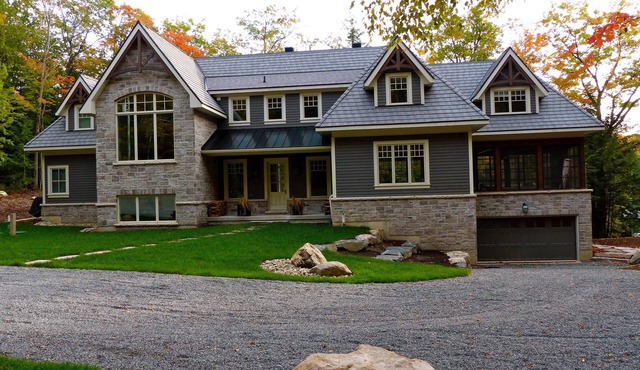 Stunning Cottage on Lake Joe! 6 bdrm,6 bath,2 slip boathouse! Water Toys Galore!