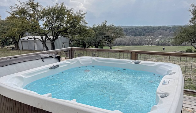 Stunning dog-friendly home with game room, hot tub, water view, & W/D