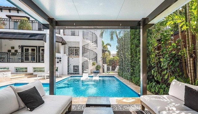 Stunning Florida backyard oasis w/access to a private residences beach