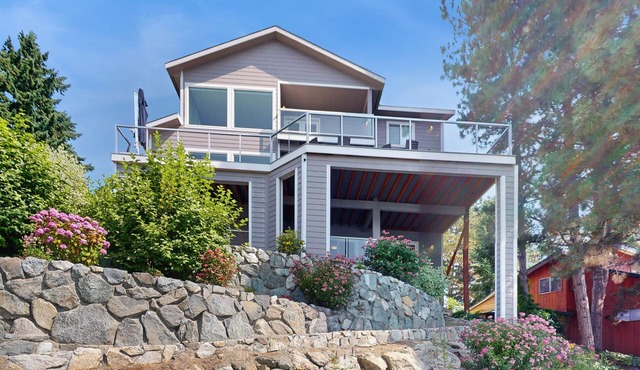 Stunning home on the water with large deck, private dock, firepit