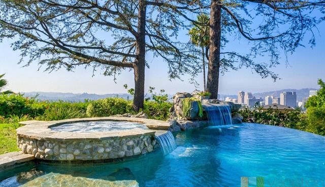 Stunning home with infinity pool, hot tub, and unbeatable panoramic views.