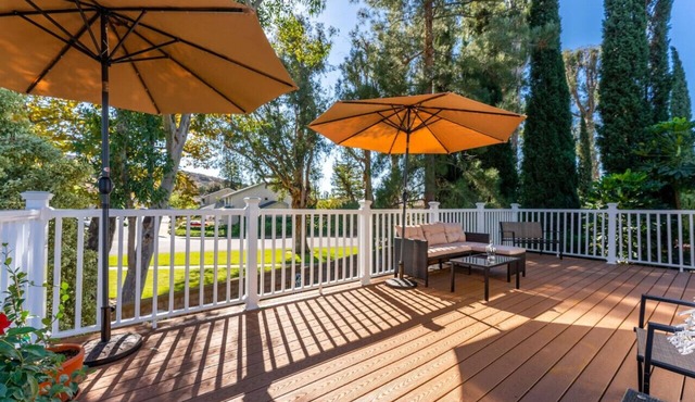 STUNNING HOME WITH SPA, FRONT AND BACK YARD, HUGE DECK, OUTSTANDING LOCATION