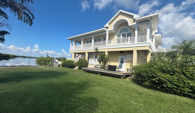 Stunning Key West Style Waterfront Home with Exceptional Views!