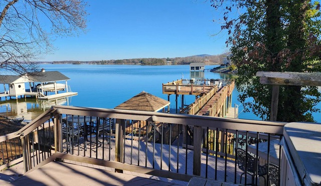 Stunning lake front with private dock and pontoon boat available for rent