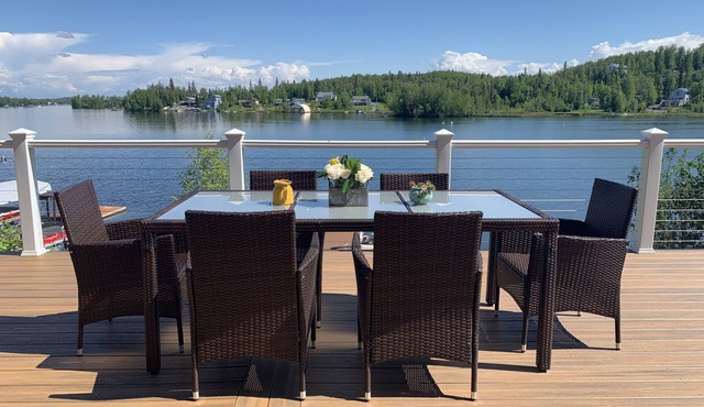 Stunning lake retreat with gorgeous deck, lakeside hot tub & spacious rec room.