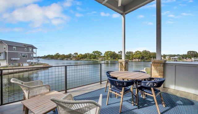 Stunning lakefront home w/pickleball, shared pool & sand volleyball