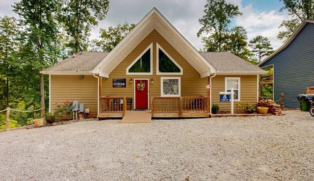 Stunning Lakeview Home with game room, fire pit, dock, & hot tub