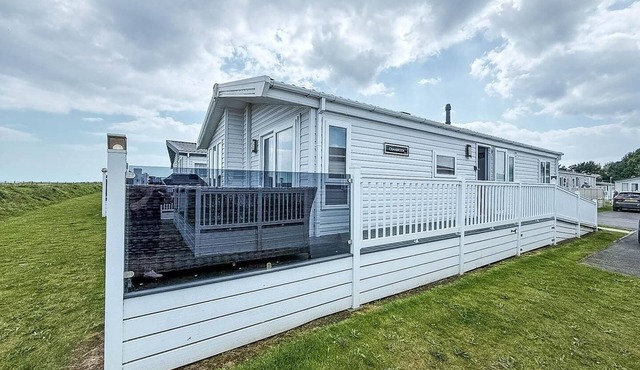 Stunning lodge with full sea views and decking at Broadland Sands ref 20076CF