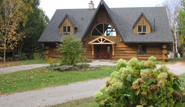 Stunning Log Home on a Private Lake