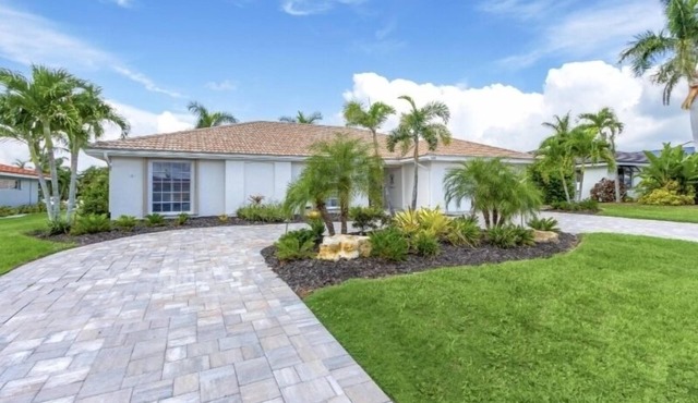 STUNNING! LUXURY WATERFRONT HOME - HEATED POOL- Close to Harbor/Fish Village