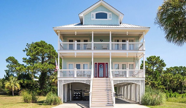 Stunning Marsh Views, 2 Golf Carts Included, 2 Master Suites, expansive decks with ocean breeze