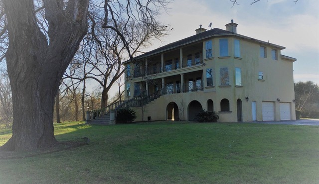 Stunning Mediterranean Style Home on the Guadalupe River in Downtown Seguin