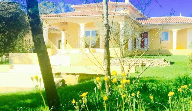 Stunning Mediterranean Villa with Waterfall Swimming pool a large garden.