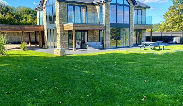 Stunning modern home set in beautiful grounds.