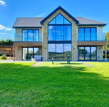 Stunning modern home set in beautiful grounds.