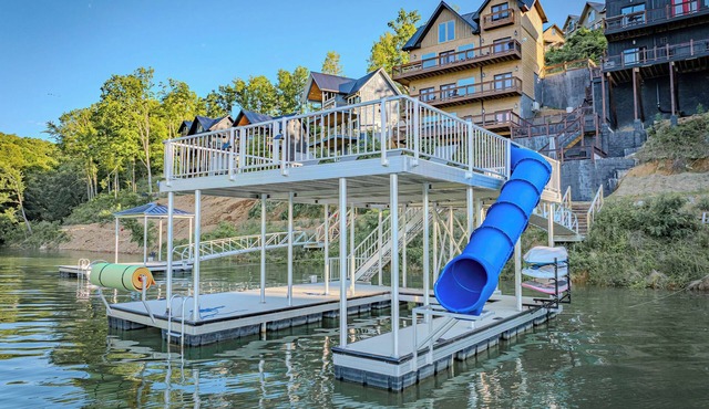Stunning Mtn Lodge on Lake with two Story Dock, Indoor Pool, Hot Tub, and Arcade