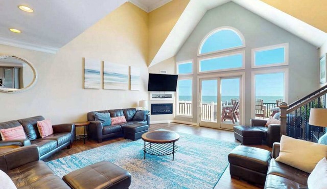 Stunning oceanfront home with private indoor/outdoor pools, game room, theater