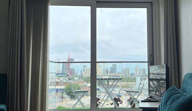 Stunning one bed with rooftop - opposite Stadium