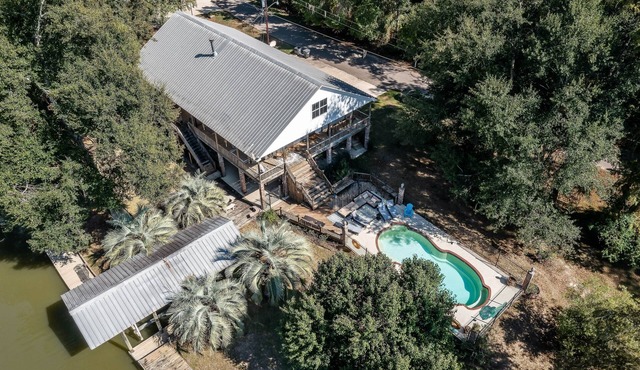 Stunning Riverside Retreat With Private Pool 5 Bedroom Home by RedAwning