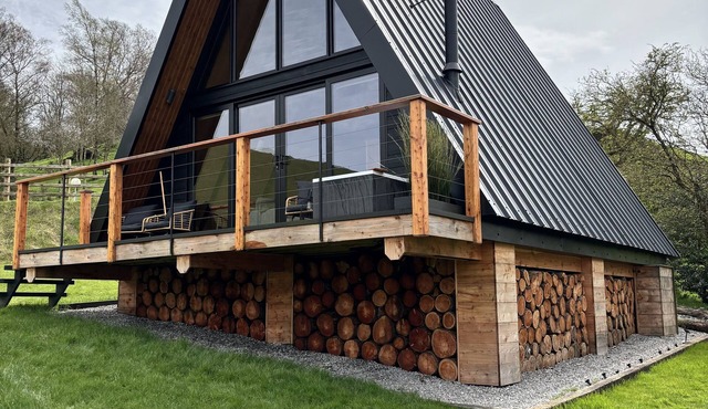 Stunning Scandinavian A Frame lodge with outside bathtub