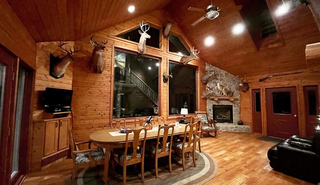 Stunning, secluded lodge nestled in the woods- minutes from town.