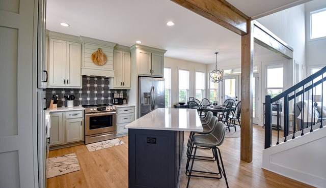 Stunning three-story home with a hot tub, firepit, washer/dryer, & views