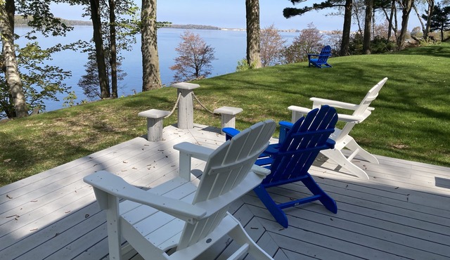 Stunning view of Hamlin Lake, w/deck, fire-pit, screened in porch. Sleeps 6.