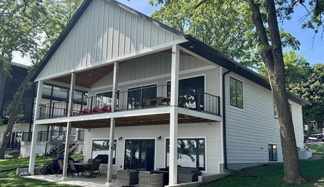 STUNNING views! Private Dock ON THE LAKE! New Construction ‘21! 4 bed-3 bath!