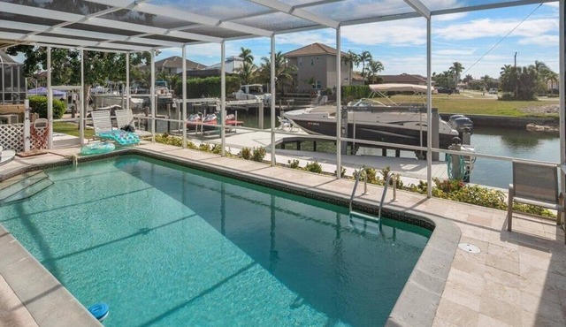Stunning Walk to the Beach Waterfront Pool Home