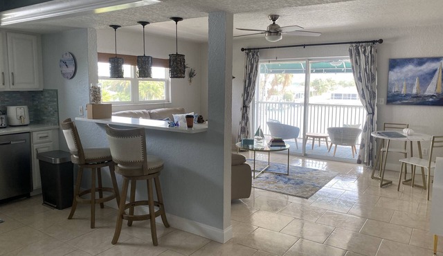 "Stunning Waterfront Apartment on Treasure Island with Dock"
