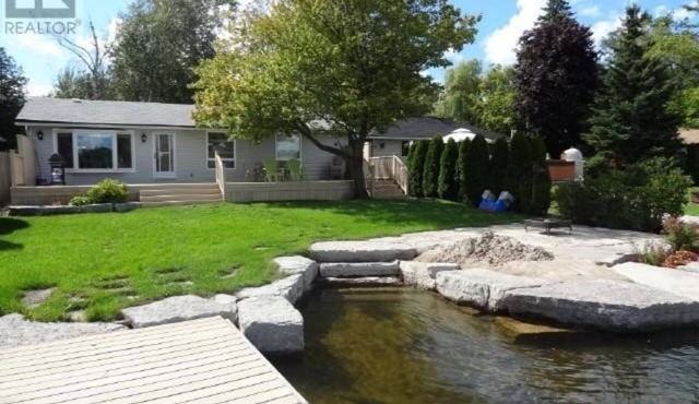 Stunning Waterfront! Easy access stairs to water, wifi. Central AC , 2 bathrooms