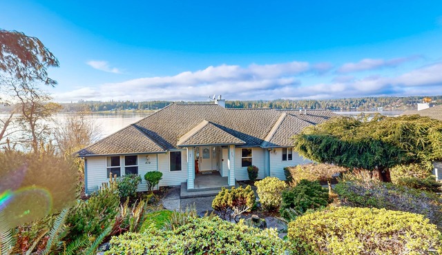 Stunning waterfront home offering breathtaking canal views & hot tub