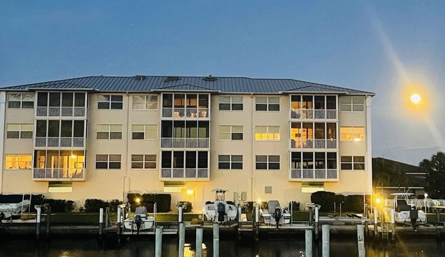 Stunning Waterfront 2-bdrm condo with Executive Office & Boat Lift