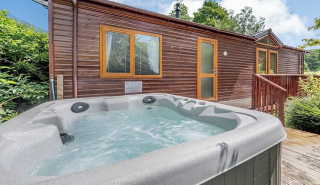 Stunning well-equipped lodge set in mature and beautiful gardens.