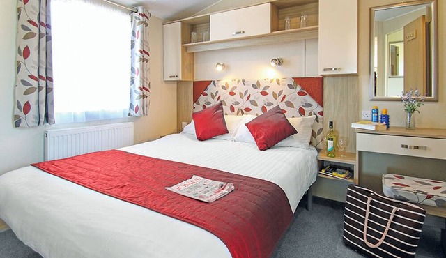 Stylish 12ft-wide caravan with one double and one twin.