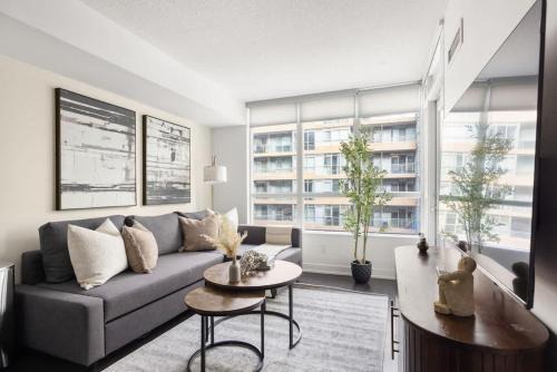 Stylish 1BR Condo with Patio Steps from Waterfront